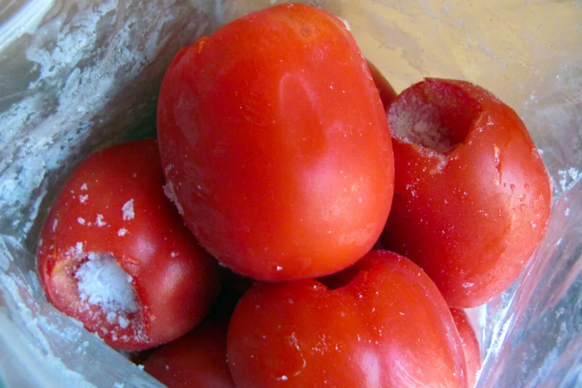 Frozen tomatoes in a freezer bag