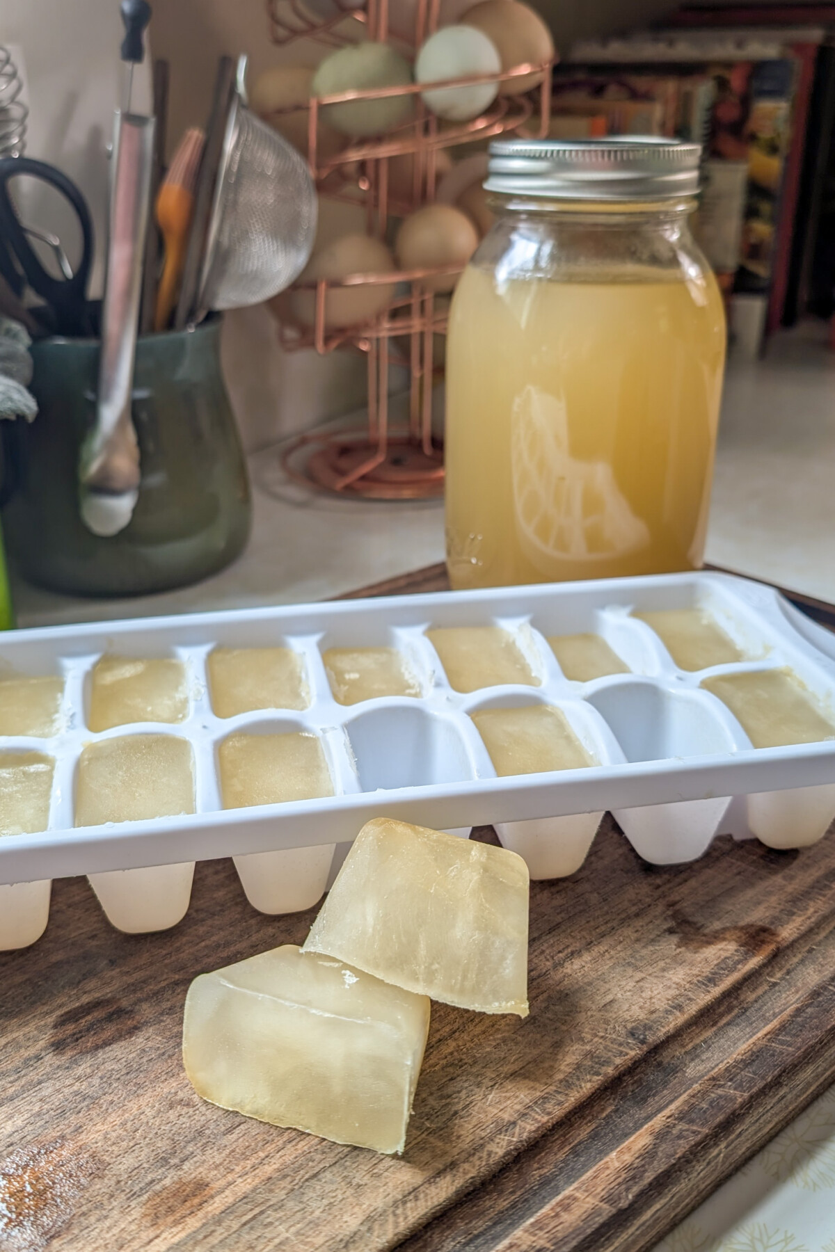 Ice cube tray filled with corn broth