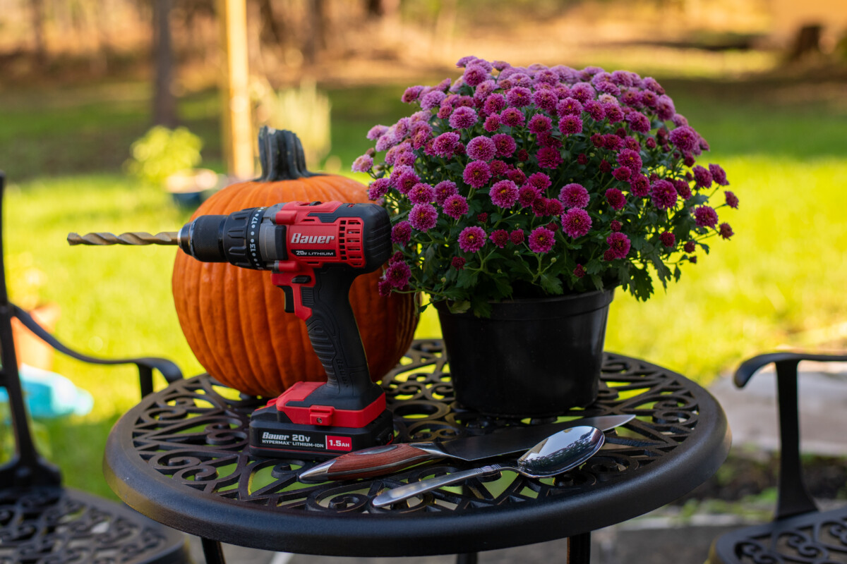 Tools needed to create a mum and pumpkin planter.