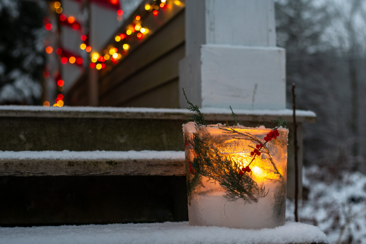 Glowing ice luminary on a step