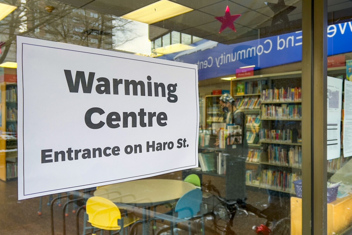 Sign on a library for community warming center